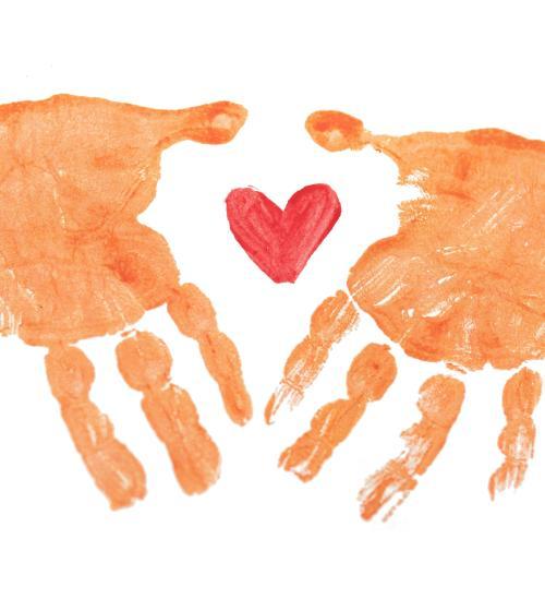 painted handprints around a heart