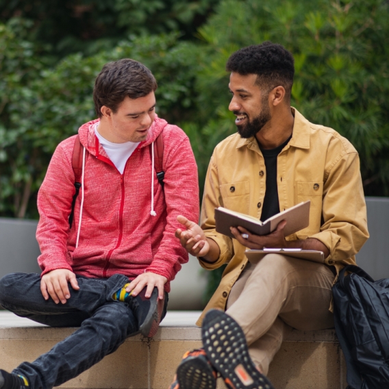 image of a two persons talking